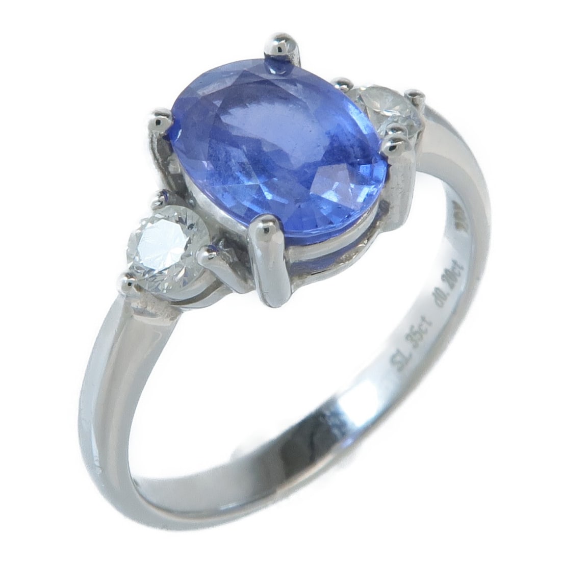 18K White Gold Sapphire Diamond Ring Size 5.75: 18K White Gold Sapphire Diamond Ring Size 5.75 A women's ring featuring a sapphire and diamond design in 18K white gold. The ring is size 5.75 and has a blue and clear color combination. It is describ