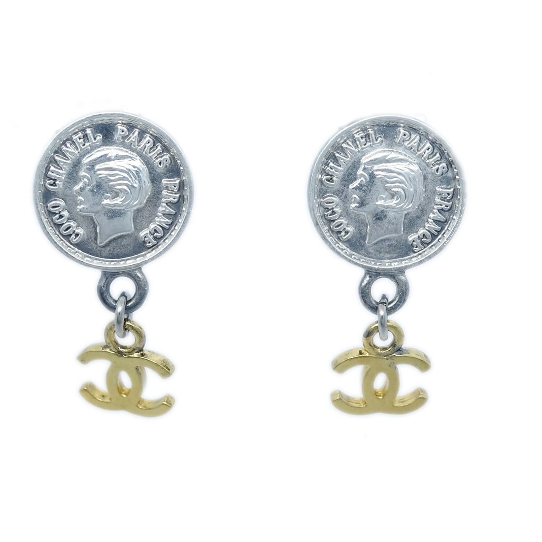 CHANEL 96P clip on dangle earrings gold and silver tone: CHANEL 96P clip on dangle earrings gold and silver tone Clip-on Chanel dangle earrings in gold and silver tones with a plated finish. Made in France, this pair features a dangle/drop style and is mark