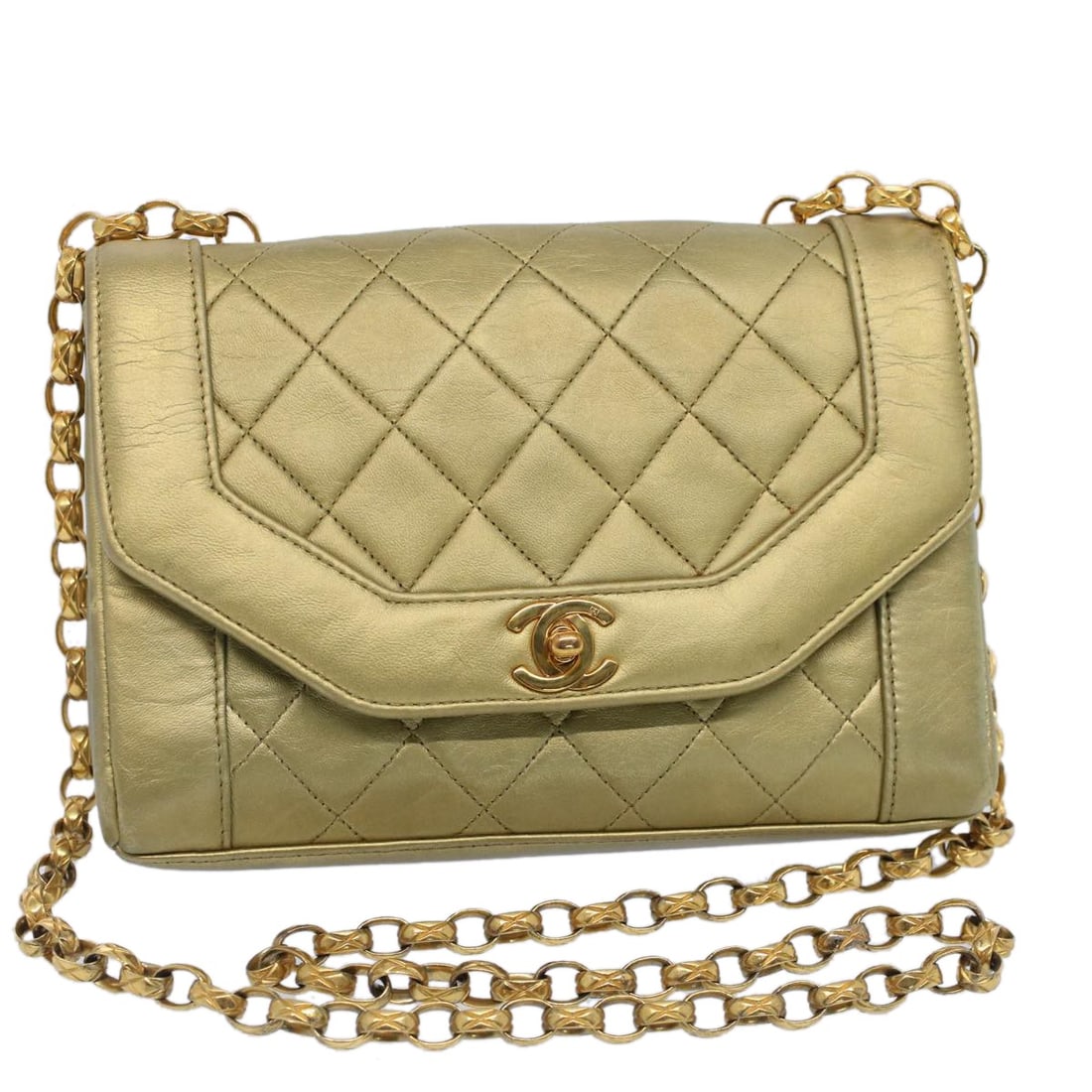 CHANEL Matelasse Lambskin Shoulder Bag Gold CC Turn Lock Chain: CHANEL Matelasse Lambskin Shoulder Bag Gold CC Turn Lock Chain A CHANEL Matelasse Turn Lock Chain Shoulder Bag in gold leather and lamb skin, made in France. This women's shoulder bag features a turn 