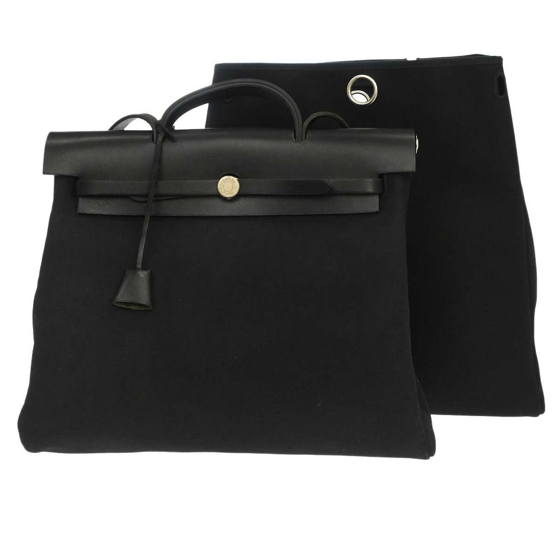Hermes Herbag MM black Toile Officier 2 in 1 handbag: Hermes Herbag MM black Toile Officier 2 in 1 handbag Hermes Herbag MM 2-in-1 handbag in black Toile Officier with leather trim, made in France. This medium women's handbag features a structured design