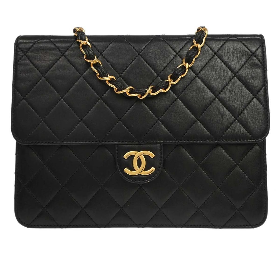 CHANEL Classic Single Flap Small Black Lambskin Shoulder Bag: CHANEL Classic Single Flap Small Black Lambskin Shoulder Bag Small Chanel shoulder bag in black lambskin with a pushlock turn-lock closure and shoulder strap. The exterior shows scuffs, and the interi