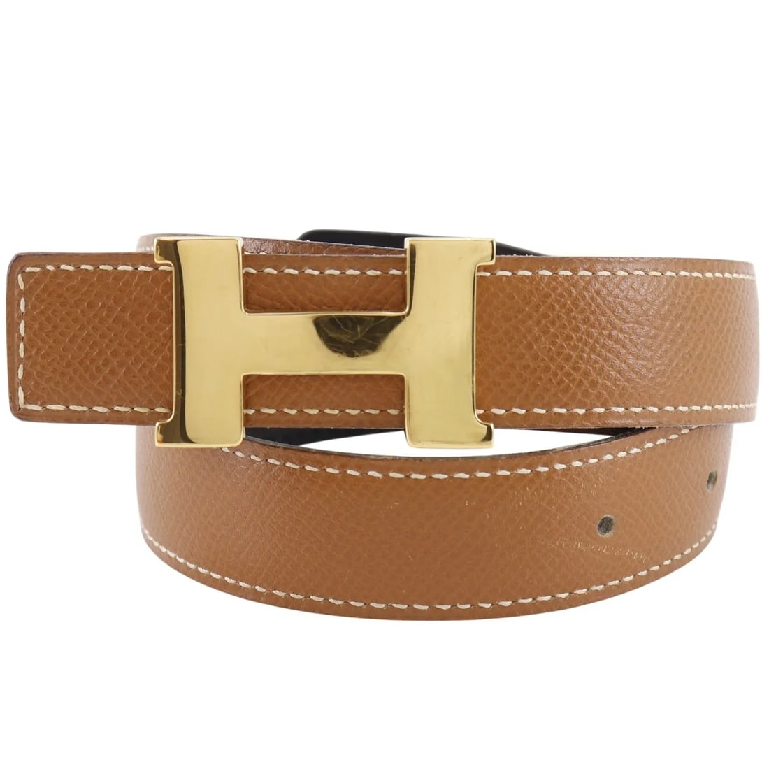 Hermes Constance leather reversible belt brown 68cm: Hermes Constance leather reversible belt brown 68cm Hermes Constance Reversible Belt in brown leather. This unisex belt is made in France and measures 68 cm wide by 2.4 cm high. Condition is good, wit