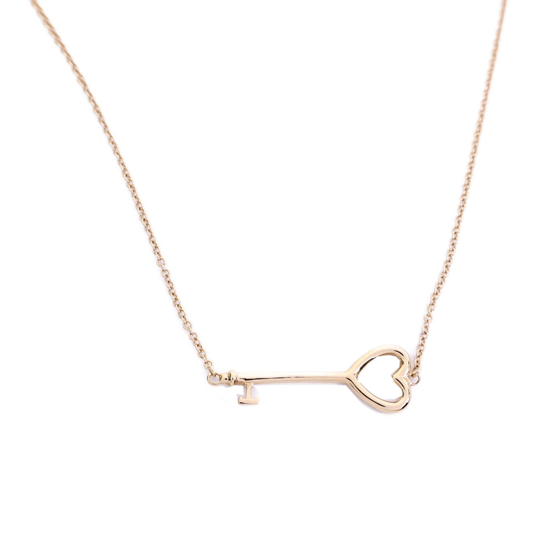 Tiffany and Co 18K Rose Gold Heart Key Necklace: Tiffany and Co 18K Rose Gold Heart Key Necklace Tiffany & Co. Heart Key Necklace in 18K pink gold (K18PG/Rose Gold). This women's necklace features a heart key motif and comes with storage bags. It is