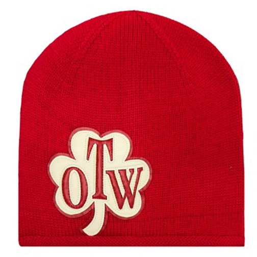 Red Knit Cuffed Beanie with OTW Leather Front Patch: Red Knit Cuffed Beanie with OTW Leather Front Patch This beanie features a bold red color crafted from soft, warm knit fabric. It includes a premium leather OTW patch stitched on the front and a cuffe