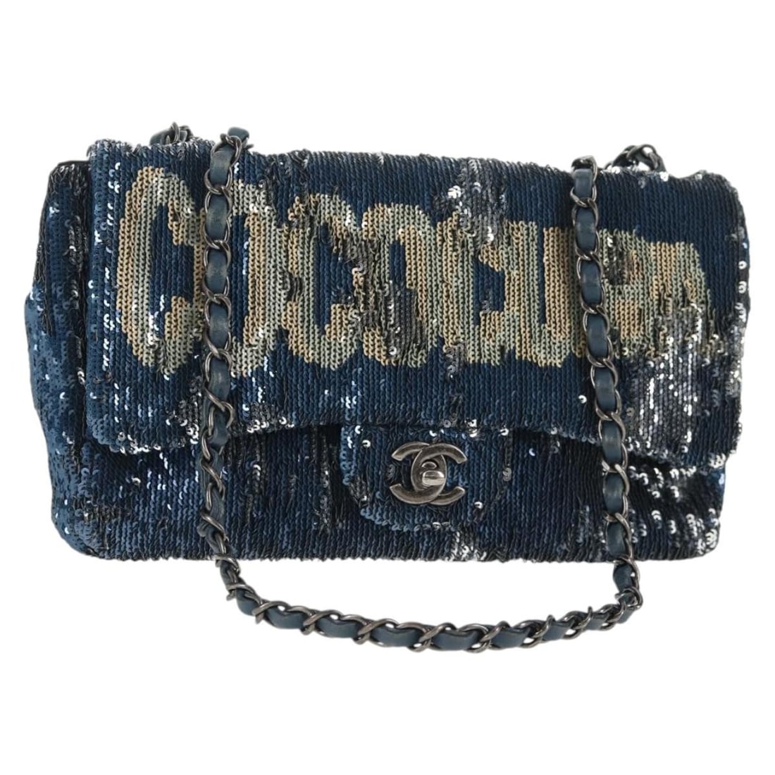 CHANEL CC Blue Silver Sequin Leather Shoulder Bag with Dust Bag: CHANEL CC Blue Silver Sequin Leather Shoulder Bag with Dust Bag A CHANEL shoulder bag in blue and silver leather, featuring a sequin design and CC detail. It comes with a dust bag and was made in Ital