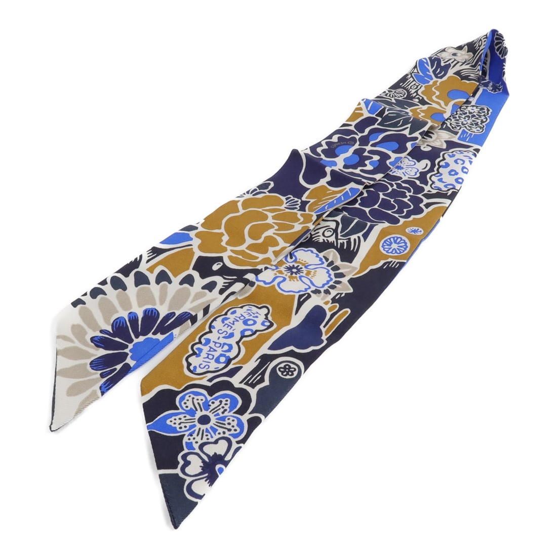Hermes Twilly Silk Scarf in Navy and Blue: Hermes Twilly Silk Scarf in Navy and Blue A Hermes Twilly scarf in navy blue silk. The item is in very good AB condition and measures 86 cm x 5 cm (33.9 in x 2.0 in). Accessories are not included. Spe
