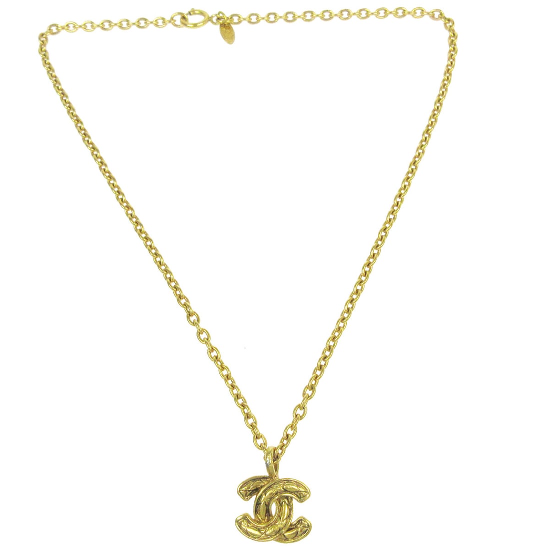 Chanel CC Pendant Necklace Gold Tone 21.3 Inch France: Chanel CC Pendant Necklace Gold Tone 21.3 Inch France Gold-tone Chanel pendant necklace featuring a CC quilted logo charm pendant. The necklace has a 21.3-inch overall length and was made in France. C