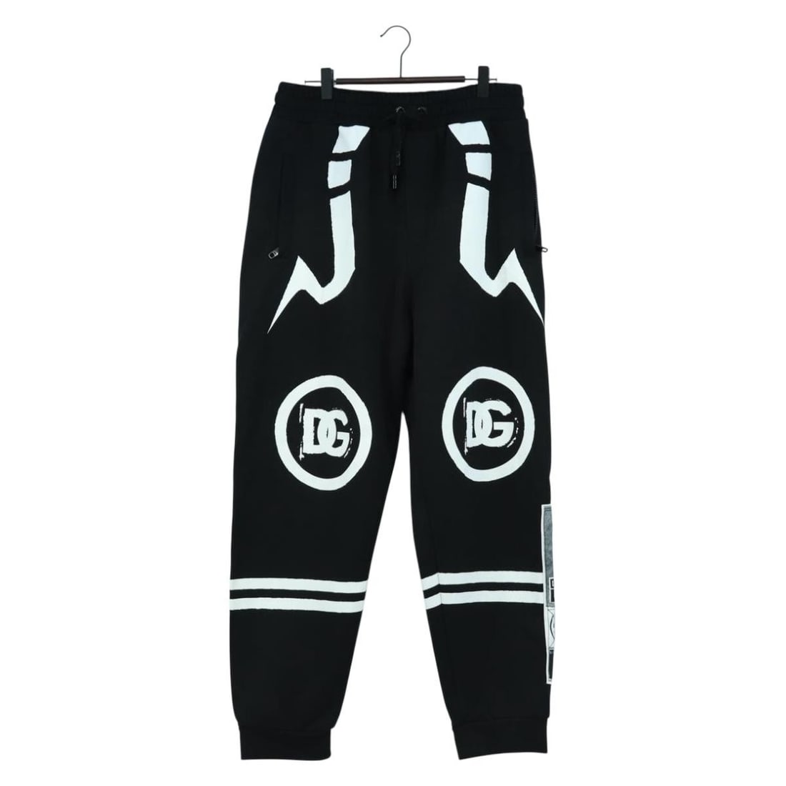 Dolce&Gabbana x Jujutsu Kaisen Black Cotton Women's Jogger Pants: Dolce&Gabbana x Jujutsu Kaisen Black Cotton Women's Jogger Pants These Dolce&Gabbana x Jujutsu Kaisen women's jogger pants are crafted from black cotton and manufactured in Italy. The pants feature a 