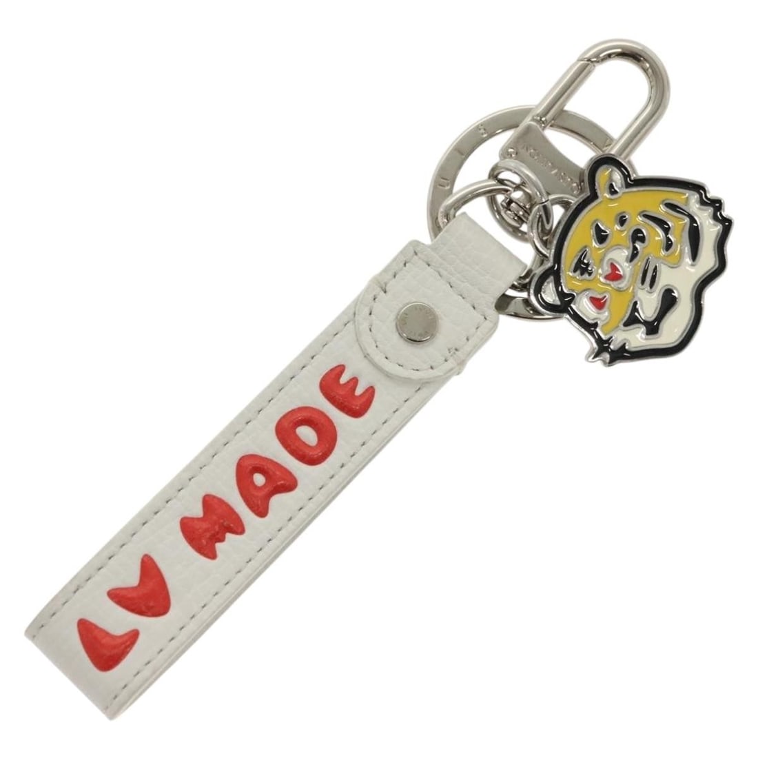 Louis Vuitton MP3225 Nigo White Metal Dragonne Key Ring: Louis Vuitton MP3225 Nigo White Metal Dragonne Key Ring Louis Vuitton x NIGO collaboration Dragonne key ring in white metal. Made in Italy, this key ring includes the dust bag and item box. Condition 