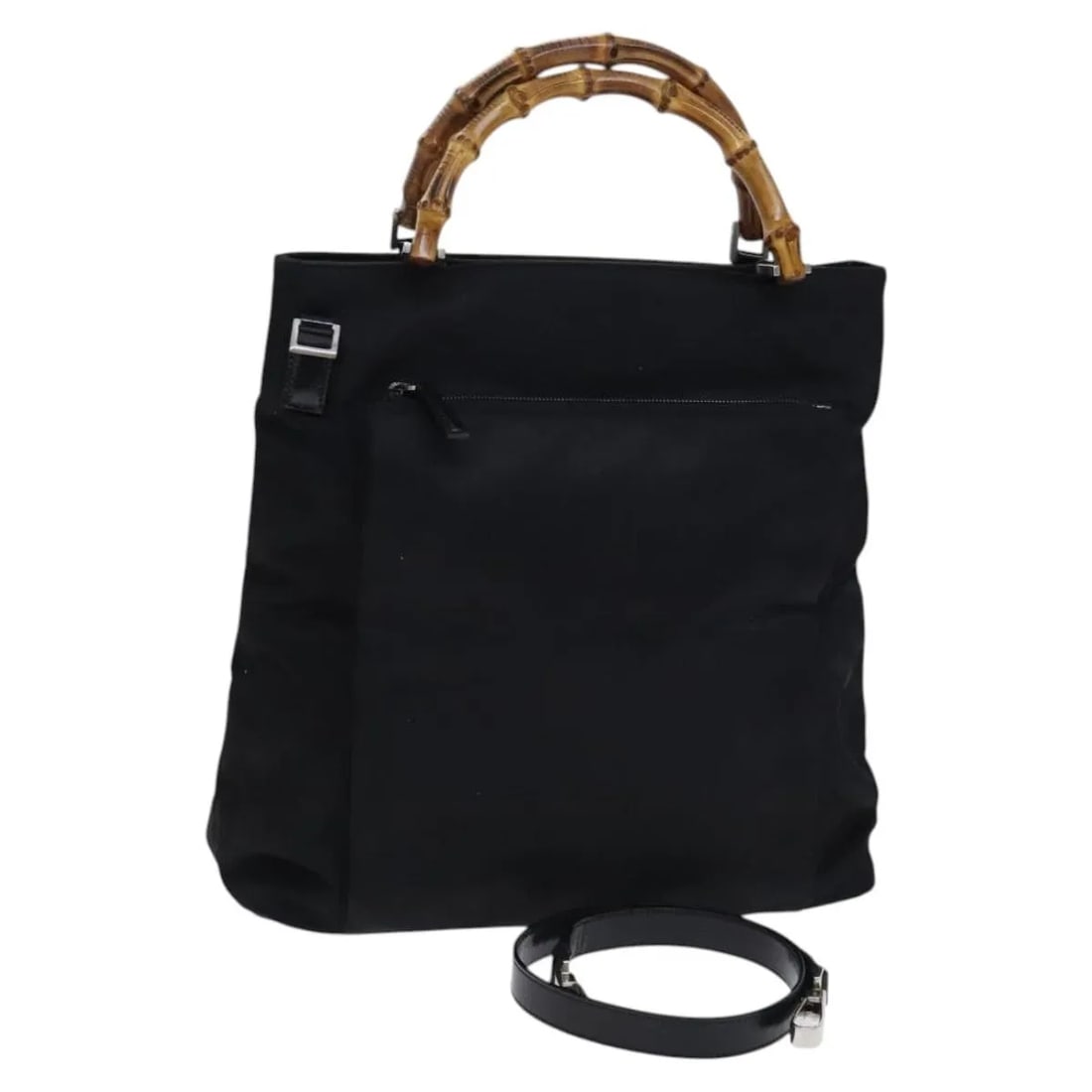 Gucci Vintage Bamboo Handle Nylon Tote Black: Gucci Vintage Bamboo Handle Nylon Tote Black This Gucci Vintage Bamboo Handle Bag features a classic black nylon exterior, complemented by the brand's iconic bamboo handle. Designed for women, the bag