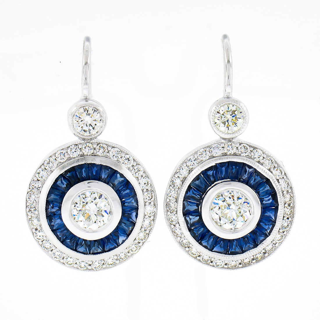 14K White Gold Sapphire Halo Diamond Drop Earrings Leverback: 14K White Gold Sapphire Halo Diamond Drop Earrings Leverback These un-used 14K white gold drop earrings showcase a striking design featuring antique old European cut diamonds at the center, each bezel