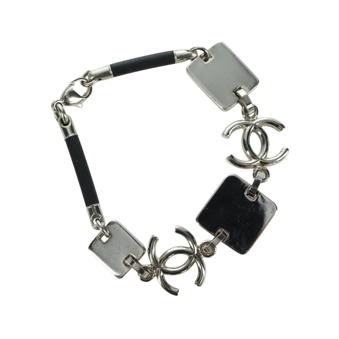 Silver Metal CC Bracelet CHANEL Coco Mark France: Silver Metal CC Bracelet CHANEL Coco Mark France A CHANEL bracelet in silver-tone metal, made in France. It is a women's bracelet with a total length of approximately 19 cm (7.5 inches). The item is o