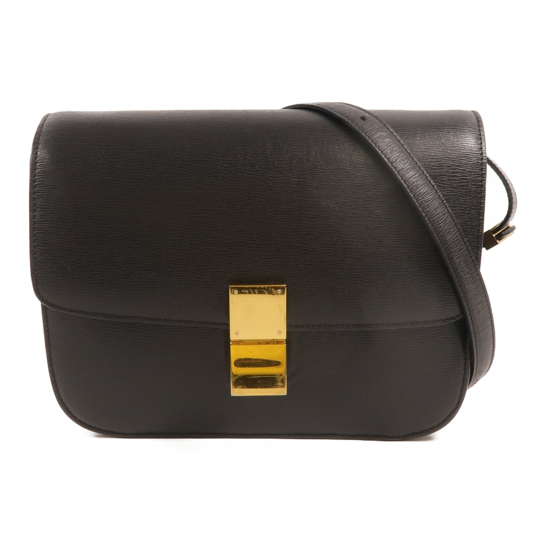 CELINE Classic Box Medium Shoulder Bag Black Calfskin with Strap: CELINE Classic Box Medium Shoulder Bag Black Calfskin with Strap Classic medium shoulder bag in black calfskin leather with a flap closure and shoulder strap. It features two open interior pockets and