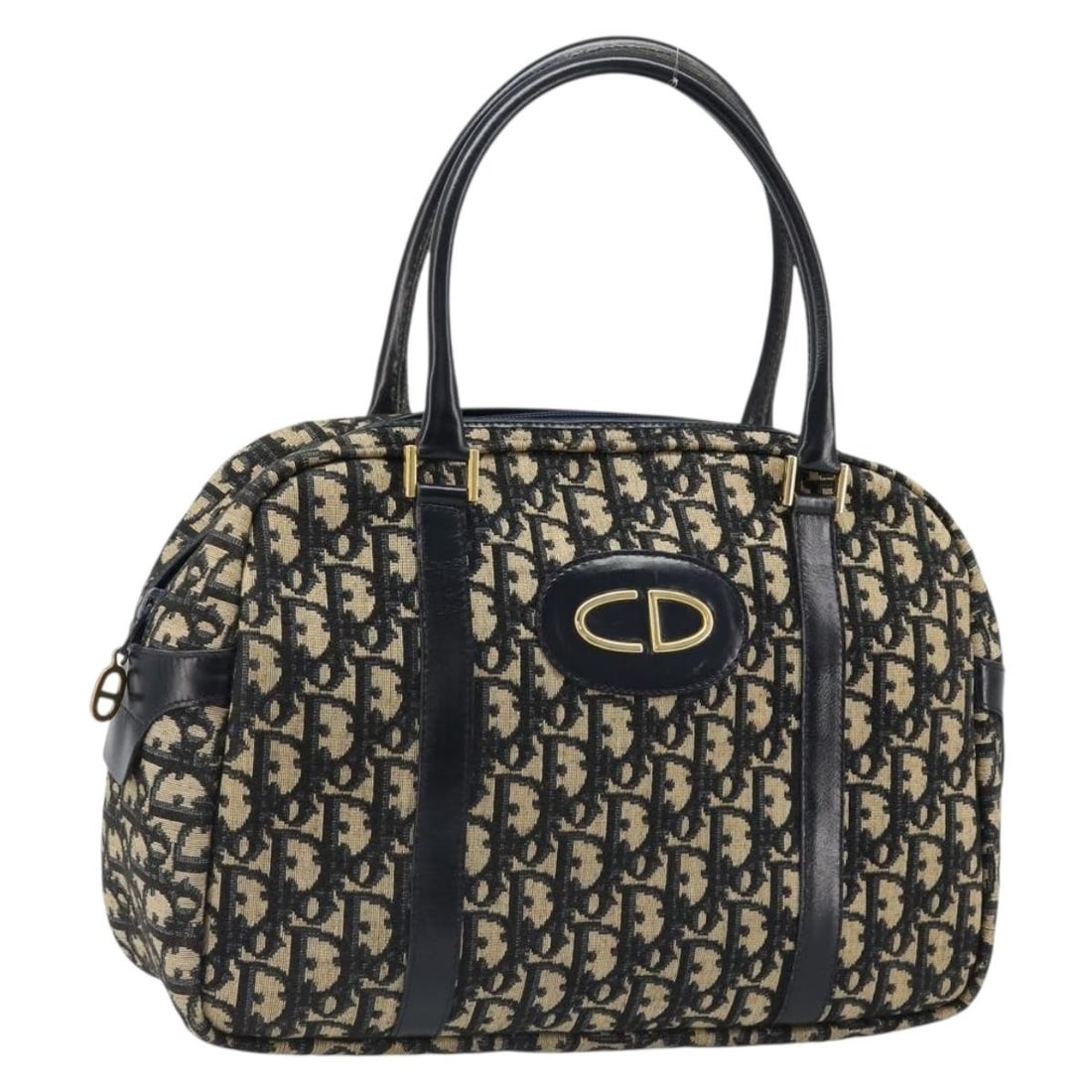 Christian Dior Mini Boston Bag in Navy Gold Trotter Canvas: Christian Dior Mini Boston Bag in Navy Gold Trotter Canvas Christian Dior Trotter Canvas Mini Boston Bag in navy and gold, made in France. This women's Boston bag is crafted from Trotter Canvas with a