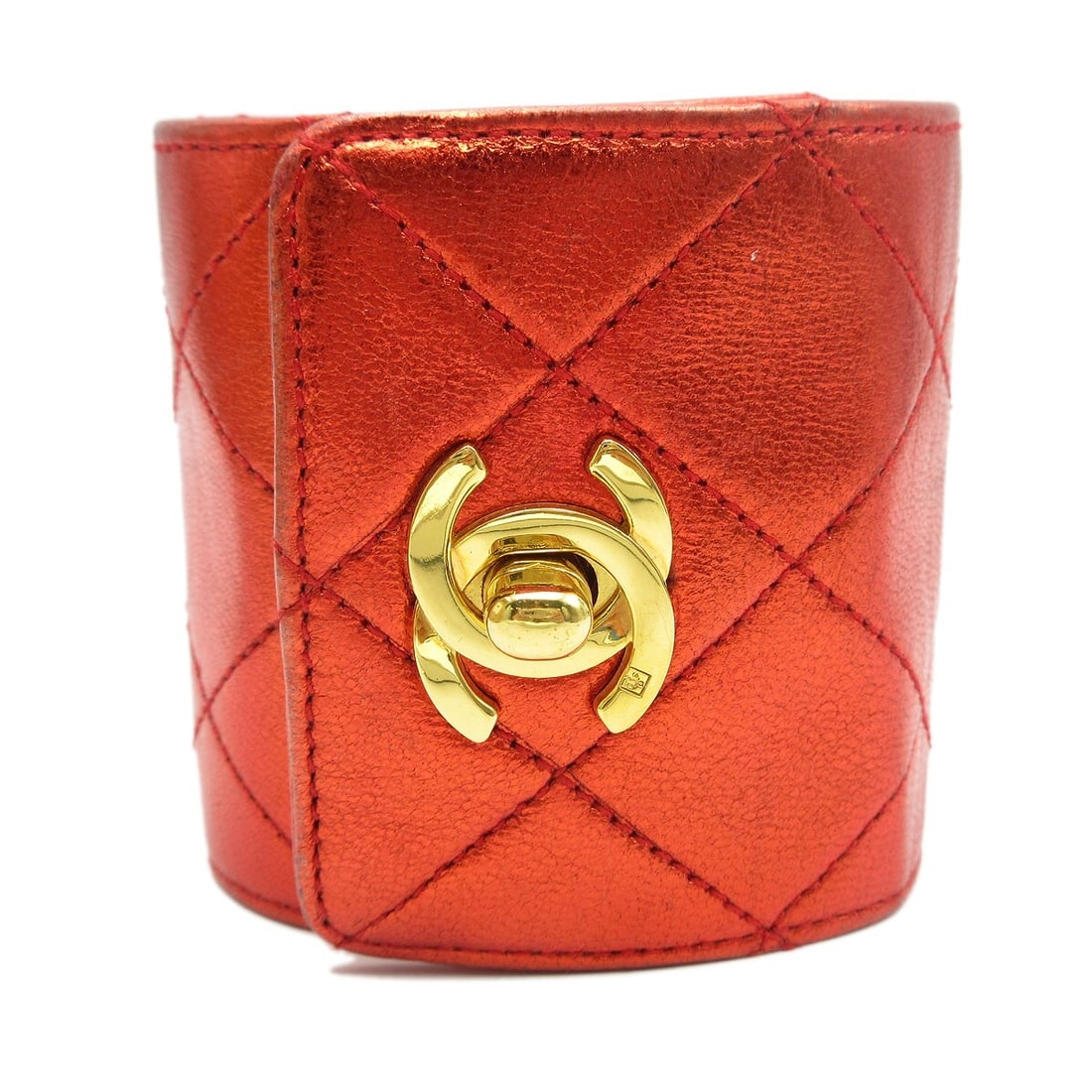 Chanel Turnlock red lambskin bangle bracelet gold plated: Chanel Turnlock red lambskin bangle bracelet gold plated Vintage Chanel turnlock bangle bracelet in red lambskin with gold-plated metal accents. This bangle-style bracelet features a red exterior and 
