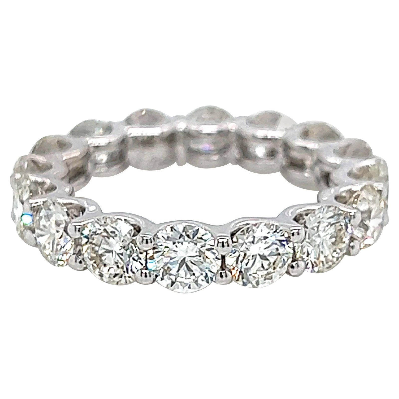 4.33ct Round Diamond Eternity Band 18k White Gold: 4.33ct Round Diamond Eternity Band 18k White Gold This stunning 4.33ct Round Diamond Eternity Band is crafted from 18k White Gold, featuring 16 round brilliant diamonds totaling 4.33 carats. The diamo