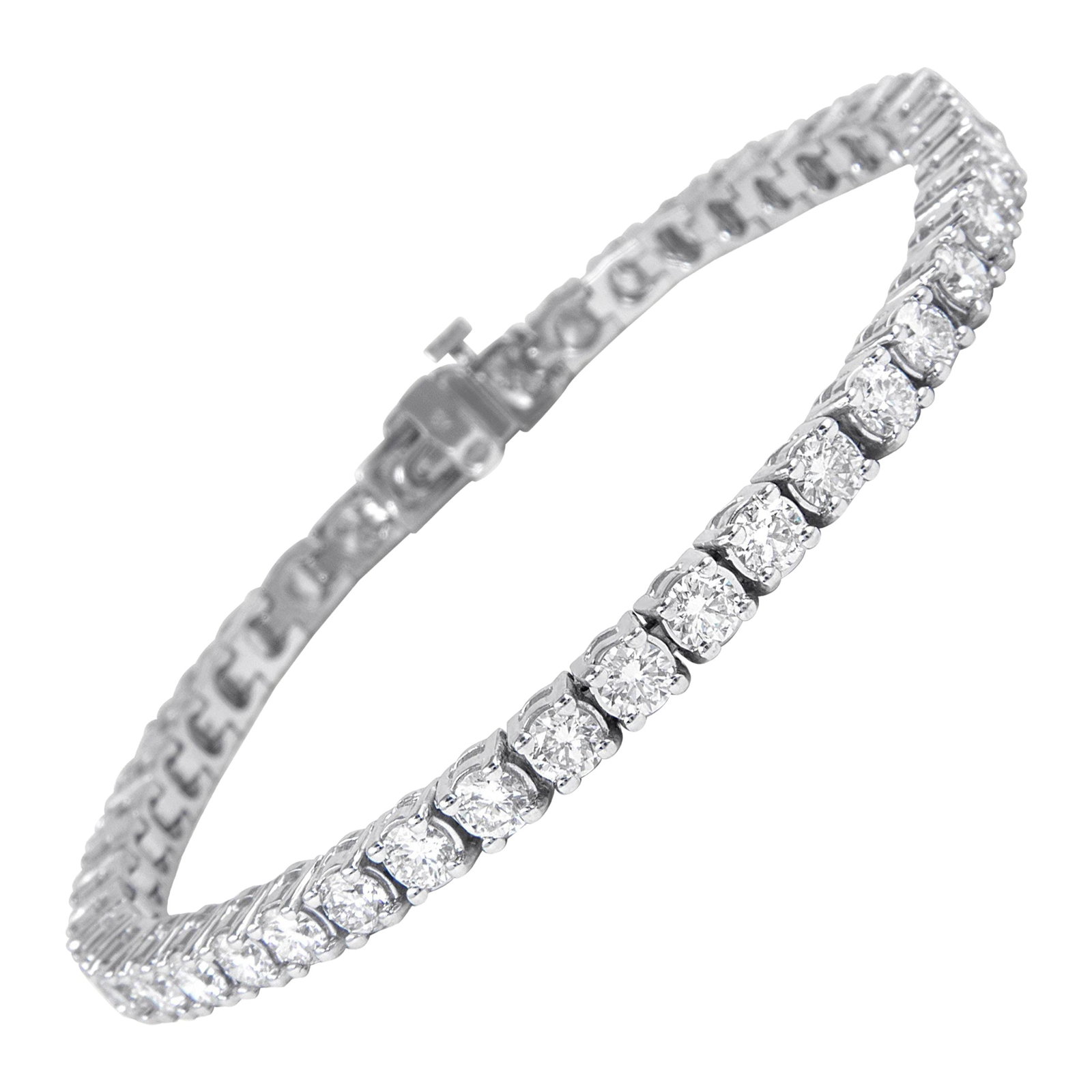 6.86 Carat Diamond Tennis Bracelet in 18k White Gold: 6.86 Carat Diamond Tennis Bracelet in 18k White Gold This exquisite tennis bracelet features 44 round brilliant diamonds totaling 6.86 carats, with approximately H/I color and VS1 clarity. The diamond