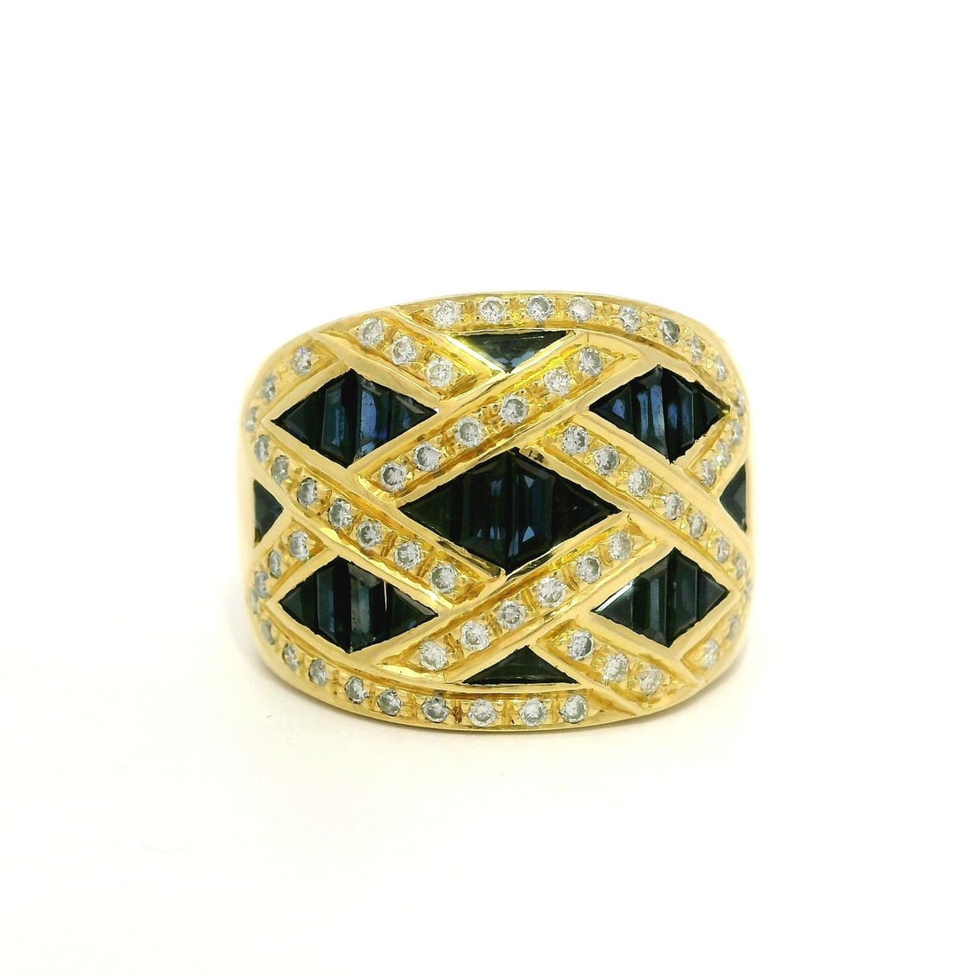 Levian 18k Yellow Gold Wide Cigar Band Ring with Sapphire and Diamond: Levian 18k Yellow Gold Wide Cigar Band Ring with Sapphire and Diamond This stunning cocktail ring features a wide cigar band design crafted from solid 18k yellow gold. It showcases a lattice design ad