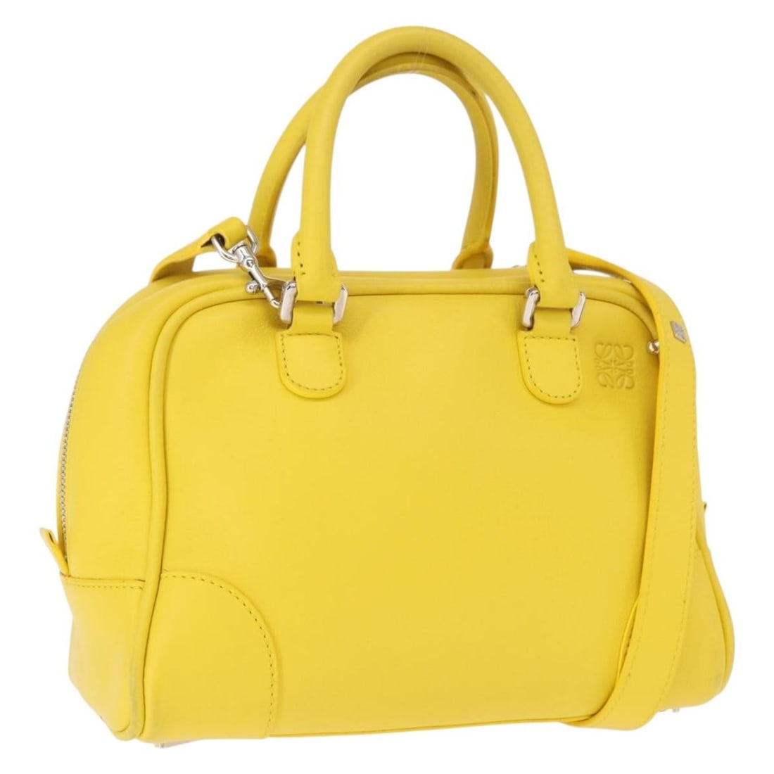 LOEWE Yellow Silver Leather 2way Hand Bag with Shoulder Strap: LOEWE Yellow Silver Leather 2way Hand Bag with Shoulder Strap LOEWE hand bag in leather with a yellow and silver color scheme. It comes with a shoulder strap and is described as a 2-way style. The ite