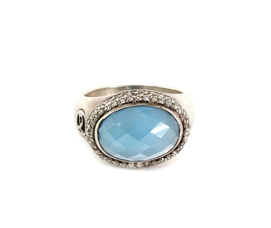 David Yurman Sterling Silver Blue Gemstone Diamond Ring Size 7: David Yurman Sterling Silver Blue Gemstone Diamond Ring Size 7 This authentic David Yurman ring is crafted from sterling silver and features a large oval, diamond-cut blue gemstone at the center. The 