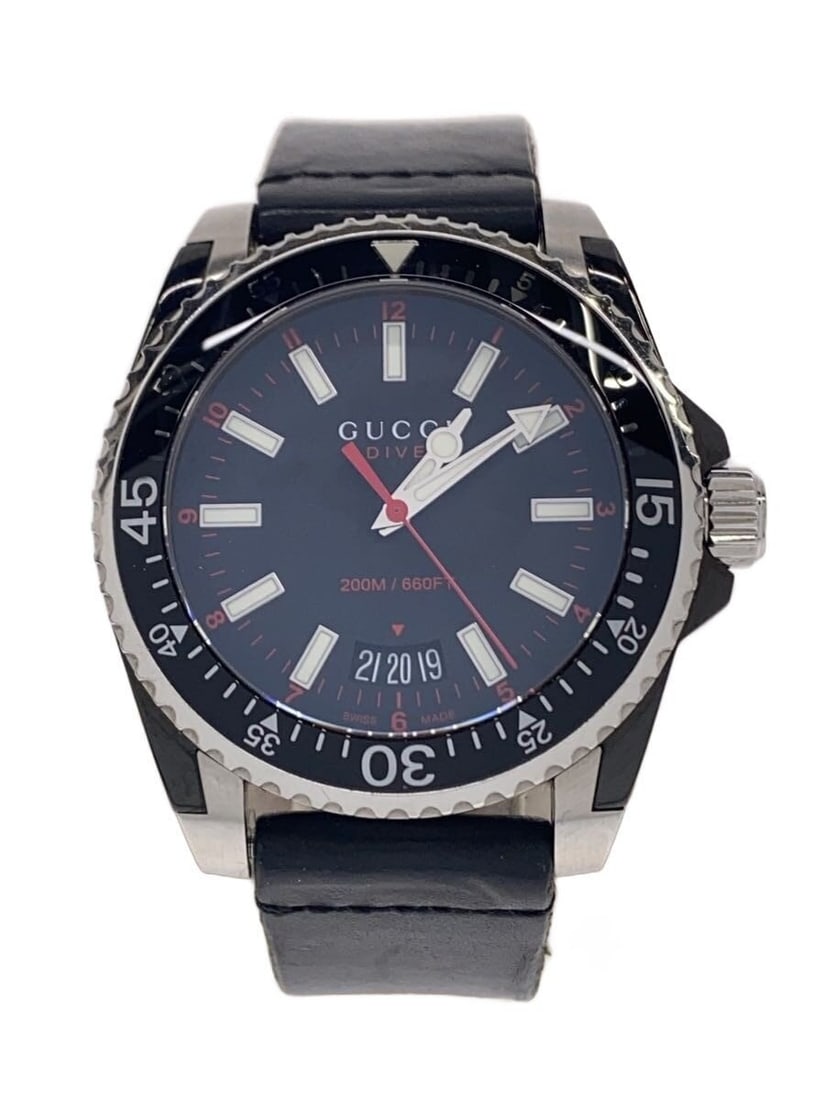 Gucci Dive Men's Swiss Quartz Leather Strap Black Dial 200M: Gucci Dive Men's Swiss Quartz Leather Strap Black Dial 200M This GUCCI DIVE men's watch features a black dial and a leather band, offering a sophisticated look with Swiss craftsmanship. The quartz mov