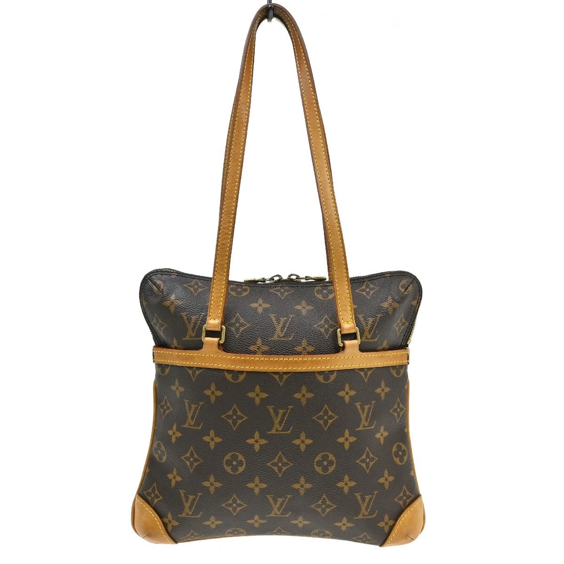 Louis Vuitton Coussin GM Monogram Shoulder Bag M51141: Louis Vuitton Coussin GM Monogram Shoulder Bag M51141 Vintage Louis Vuitton Monogram Coussin GM shoulder bag in brown Monogram canvas with leather trim and a beige lining. This women's shoulder bag fe