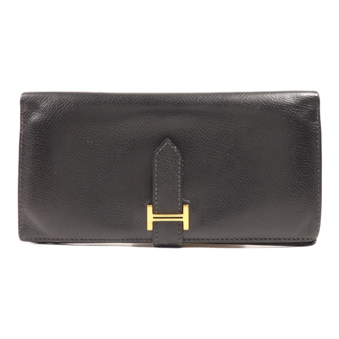 Hermes Bearn long wallet in Noir Epsom calfskin: Hermes Bearn long wallet in Noir Epsom calfskin Hermes Bearn long wallet in Noir black, crafted from Epsom leather with calfskin (cowhide) accents. The wallet features gold-tone hardware, a card pocke