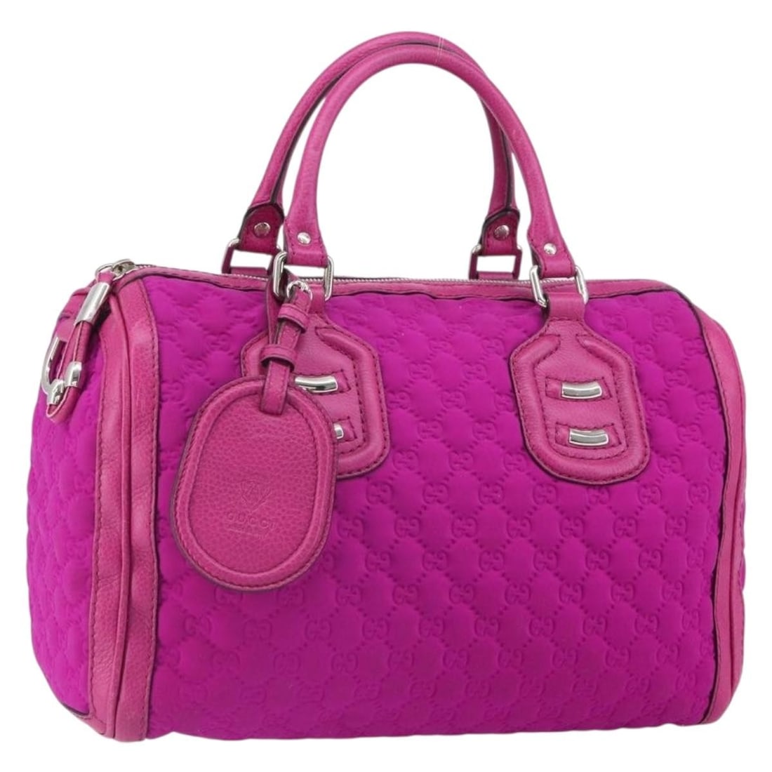 Pink GG Canvas and Nylon Boston Bag by Gucci with Silver Accents: Pink GG Canvas and Nylon Boston Bag by Gucci with Silver Accents This authentic Gucci Boston bag features a stylish pink and silver colorway crafted from nylon and GG canvas with leather accents. The 