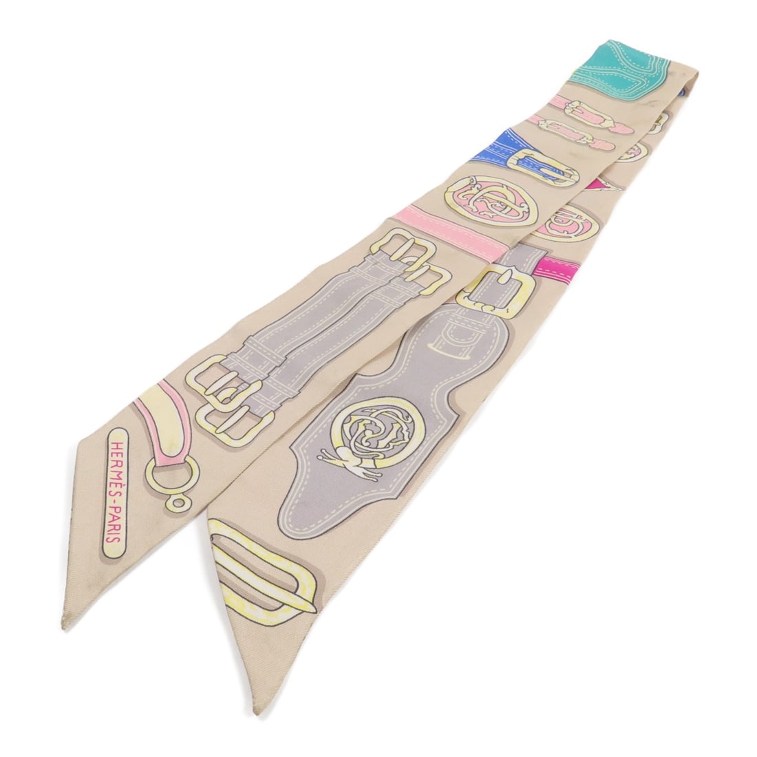 Hermes Twilly Silk Scarf Beige Pink Multicolor France: Hermes Twilly Silk Scarf Beige Pink Multicolor France Hermes Twilly scarf in silk with a beige/pink colorway. It is a women's regular-size scarf made in France and shows reasonable wear and tear. Acce