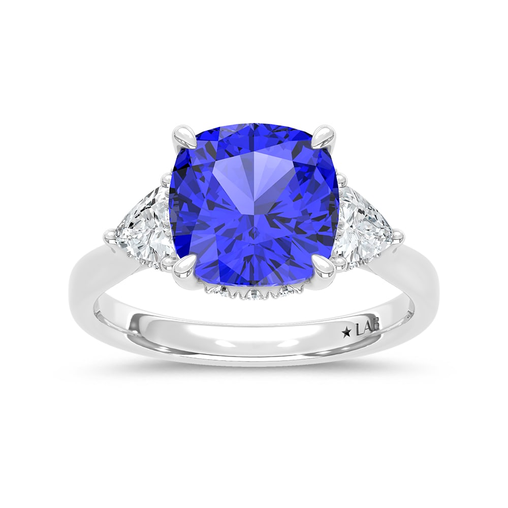 14K White Gold Lab Grown Diamond 5 1/5 Ct.Tw. Cushion Shape Recrystalized Blue Sapphire Engagement: 14K White Gold Lab Grown Diamond 5 1/5 Ct.Tw. Cushion Shape Recrystalized Blue Sapphire Engagement Ring (Center 4 1/2 ct) Exude timeless elegance with this 14K white gold engagement ring, featuring a 