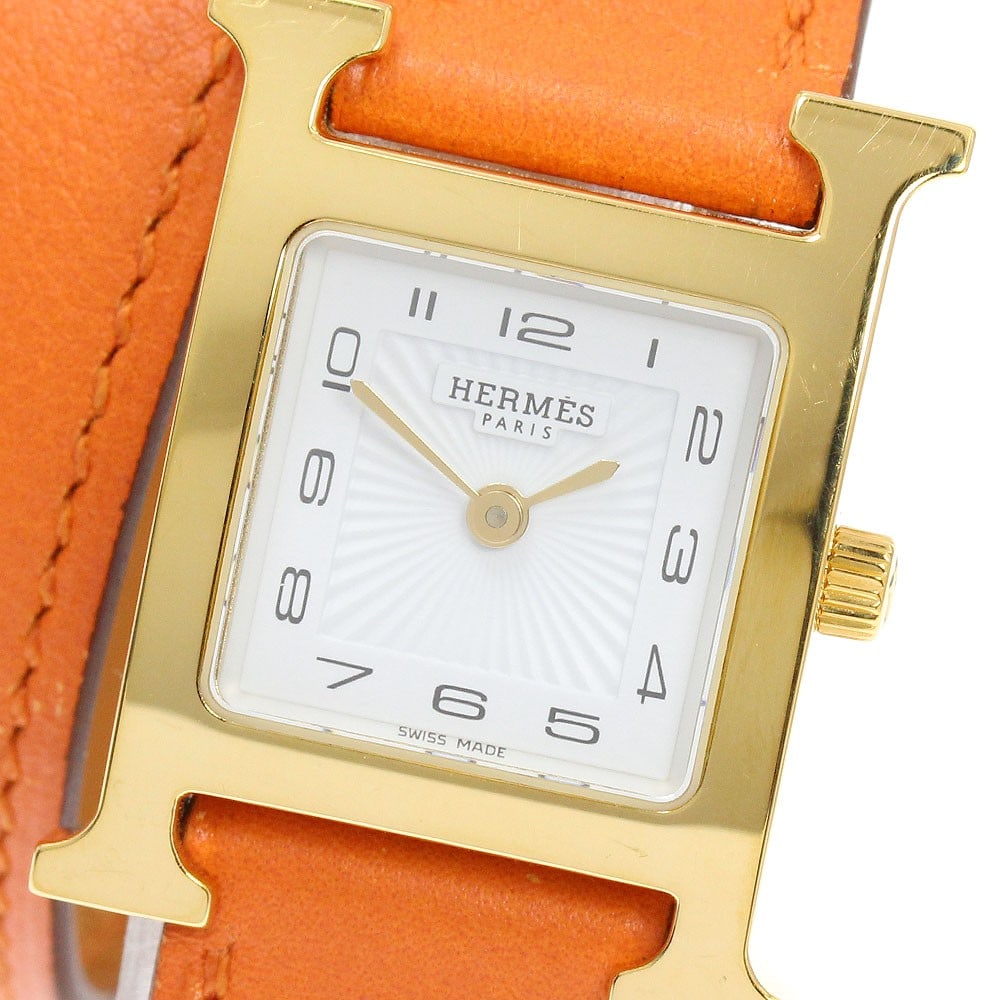Hermes H-Watch HH1.201 Double Tour Quartz Womens Wristwatch: Hermes H-Watch HH1.201 Double Tour Quartz Womens Wristwatch Hermes H-Watch Double Tour quartz women's wristwatch, model HH1.201, made in Switzerland. This pre-owned watch features a stainless steel/go