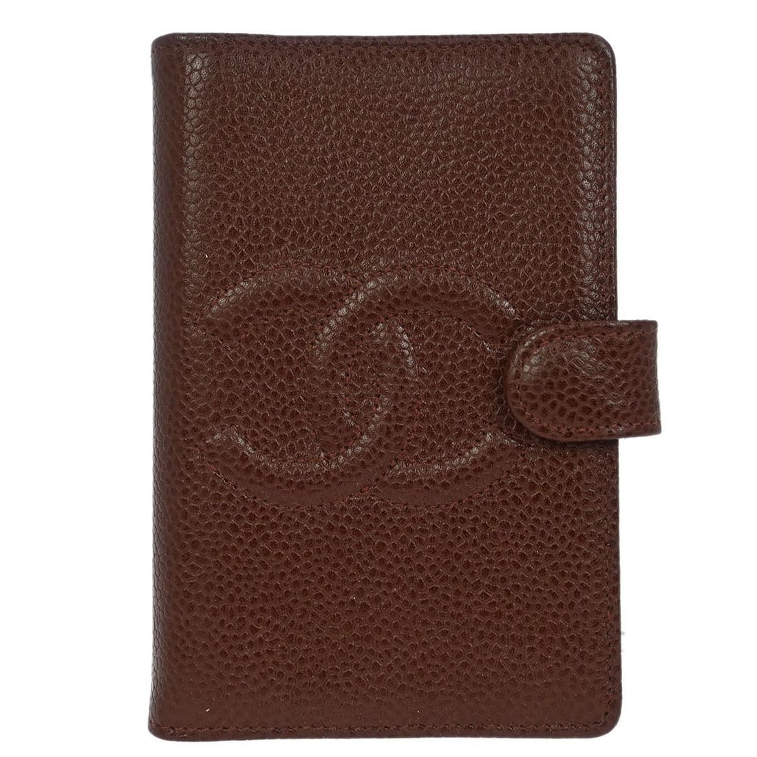 CHANEL Brown Leather Notebook Cover Made in France: CHANEL Brown Leather Notebook Cover Made in France Compact Chanel notebook cover in brown caviar skin leather, made in France. This small cover features three interior pockets and presents in very
