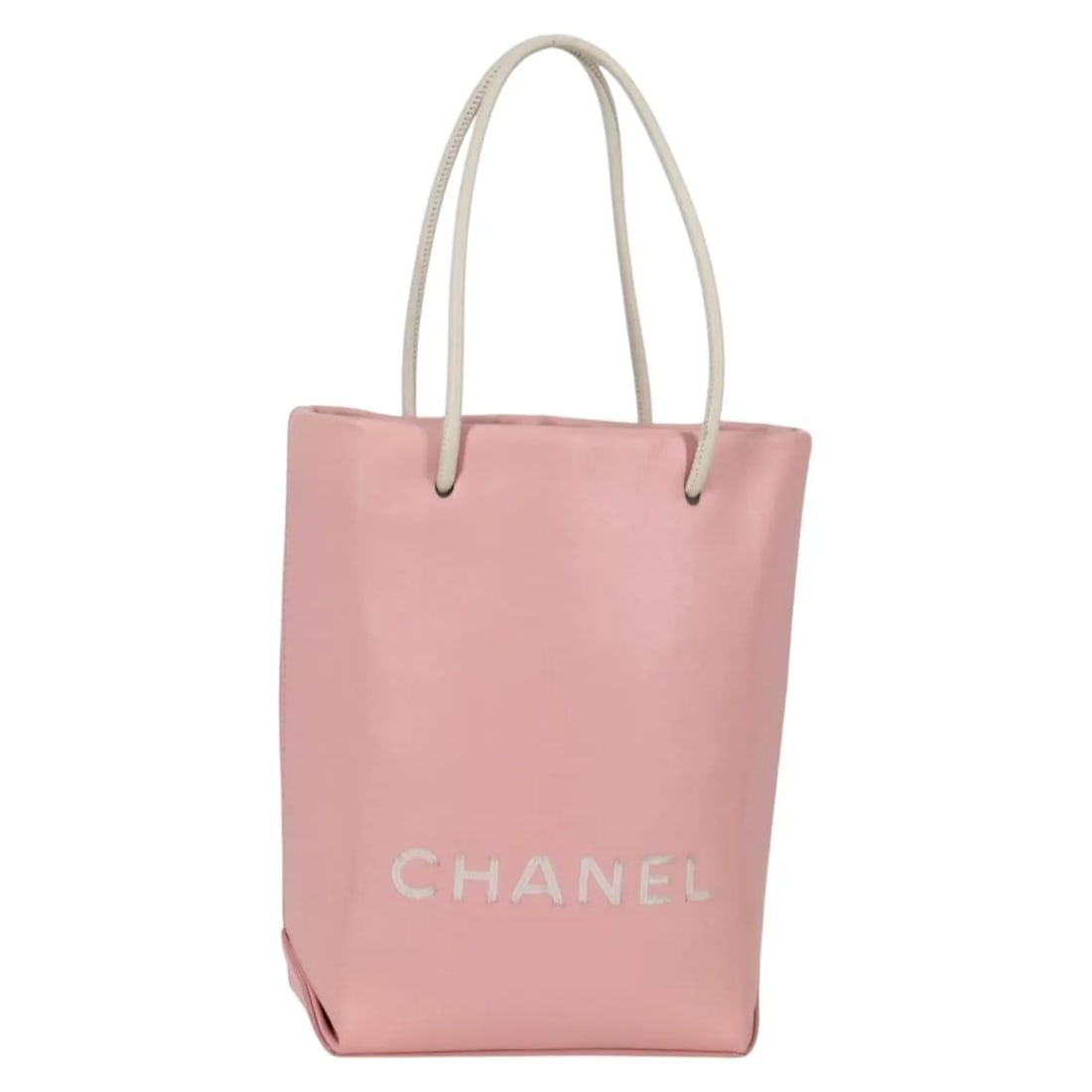 Pink Leather Chanel Tote Bag Essential Shopping Model: Pink Leather Chanel Tote Bag Essential Shopping Model This pre-owned Chanel Essential Shopping Tote in pink leather is designed for women. It features a compact size suitable for everyday use. The bag