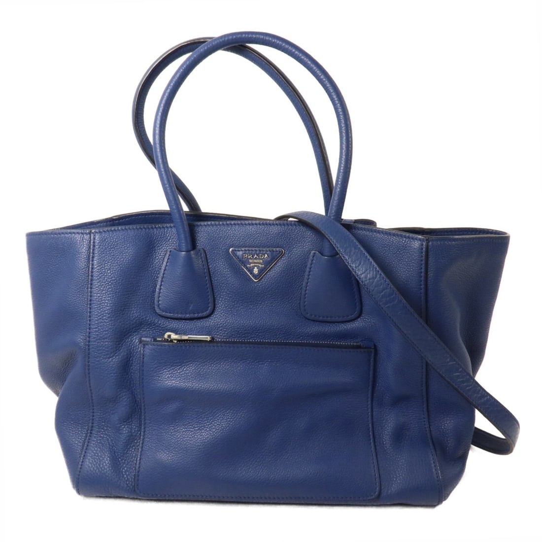 Prada BN2795 Vitello Daino Blue Calfskin 2 Way Tote Bag: Prada BN2795 Vitello Daino Blue Calfskin 2 Way Tote Bag A PRADA 2-way shoulder tote bag in blue Vitello Daino calfskin leather, model BN2795. It features a hook button closure, multiple pockets, and c