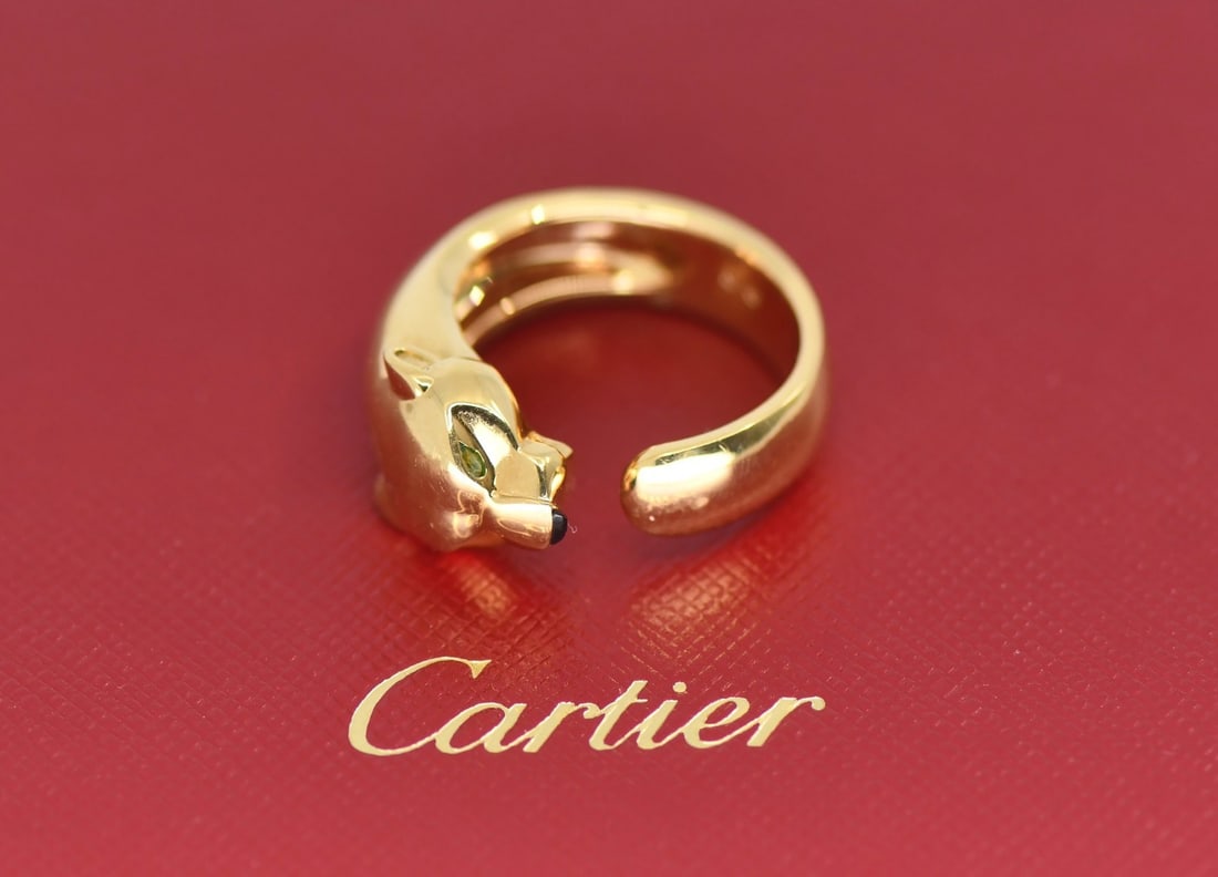 Cartier Panthere 18K Yellow Gold Tsavorite Ring Size 58: Cartier Panthere 18K Yellow Gold Tsavorite Ring Size 58 This Cartier Panthere ring is crafted from 18K yellow gold and features a striking tsavorite stone. Made in France, this elegant ring is a size 