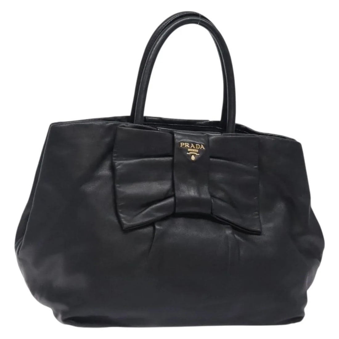 Prada Bow Tote Black Leather Handbag 27cm x 23cm x 14cm: Prada Bow Tote Black Leather Handbag 27cm x 23cm x 14cm Prada Bow Tote in black leather, designed for female use and made in Italy. The bag measures 27 cm x 23 cm x 14 cm and is offered in fair condit