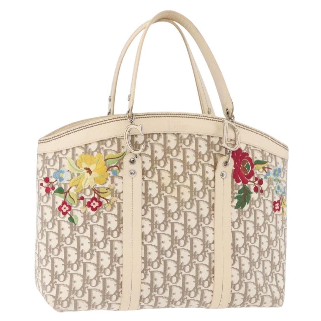 Christian Dior Trotter Canvas Tote Beige Silver Italy: Christian Dior Trotter Canvas Tote Beige Silver Italy A Christian Dior Trotter canvas tote bag in beige and silver, made in Italy. This tote bag features the Trotter canvas material and has a structur
