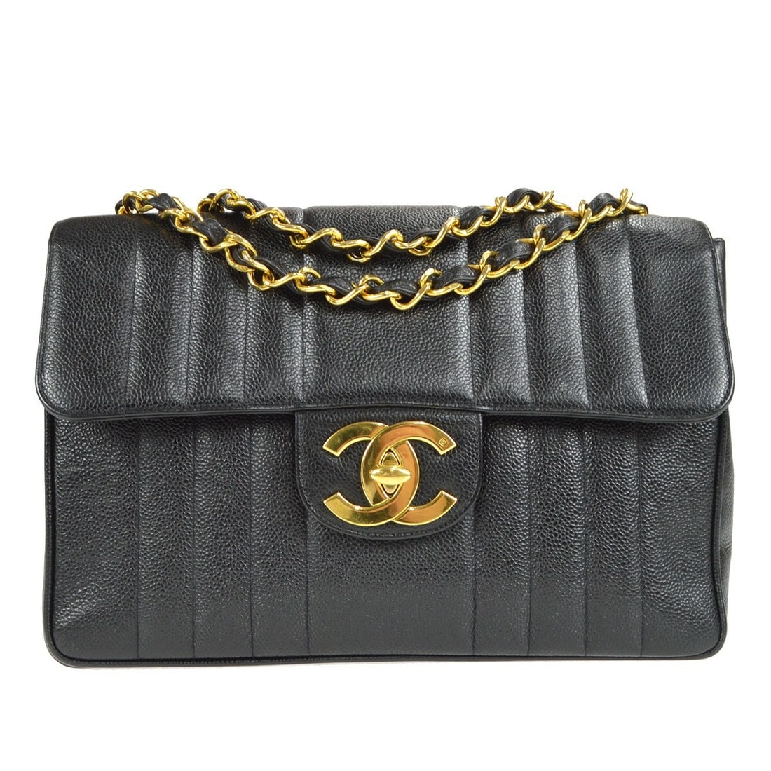 Chanel Classic Flap Jumbo Shoulder Bag Black Caviar Leather Mademoiselle: Chanel Classic Flap Jumbo Shoulder Bag Black Caviar Leather Mademoiselle Chanel Classic Flap Jumbo shoulder bag in black caviar skin leather with vertical stitch quilting and a flap turnlock closure. 