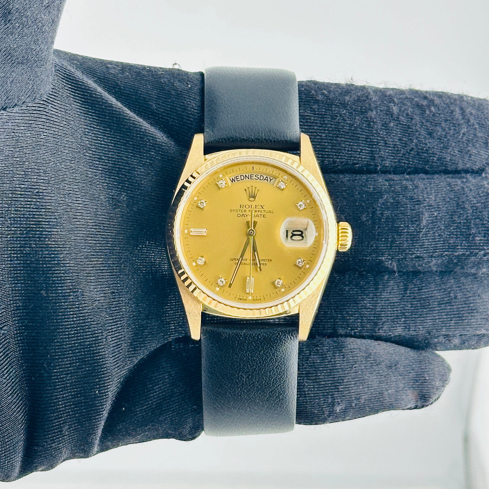 Rolex 18038 Day Date mens watch champagne diamond dial leather strap: Rolex 18038 Day Date mens watch champagne diamond dial leather strap Men's Rolex Day-Date watch, reference 18038, featuring a champagne diamond factory dial, fluted bezel, and a generic leather band. 