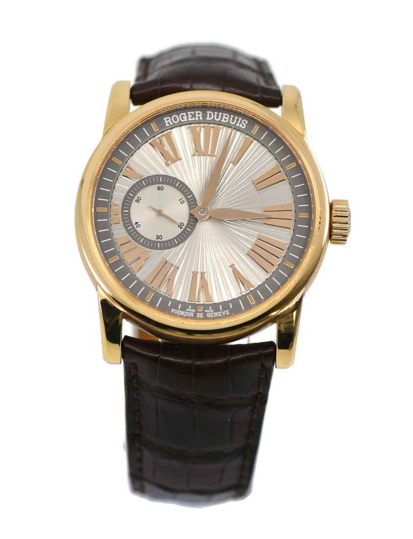 Roger Dubuis Hommage 18K Rose Gold Automatic Watch RDDBHO0565: Roger Dubuis Hommage 18K Rose Gold Automatic Watch RDDBHO0565 This exquisite Roger Dubuis Hommage wristwatch is crafted in luxurious 18K rose gold, featuring a classic round case with a diameter of 42