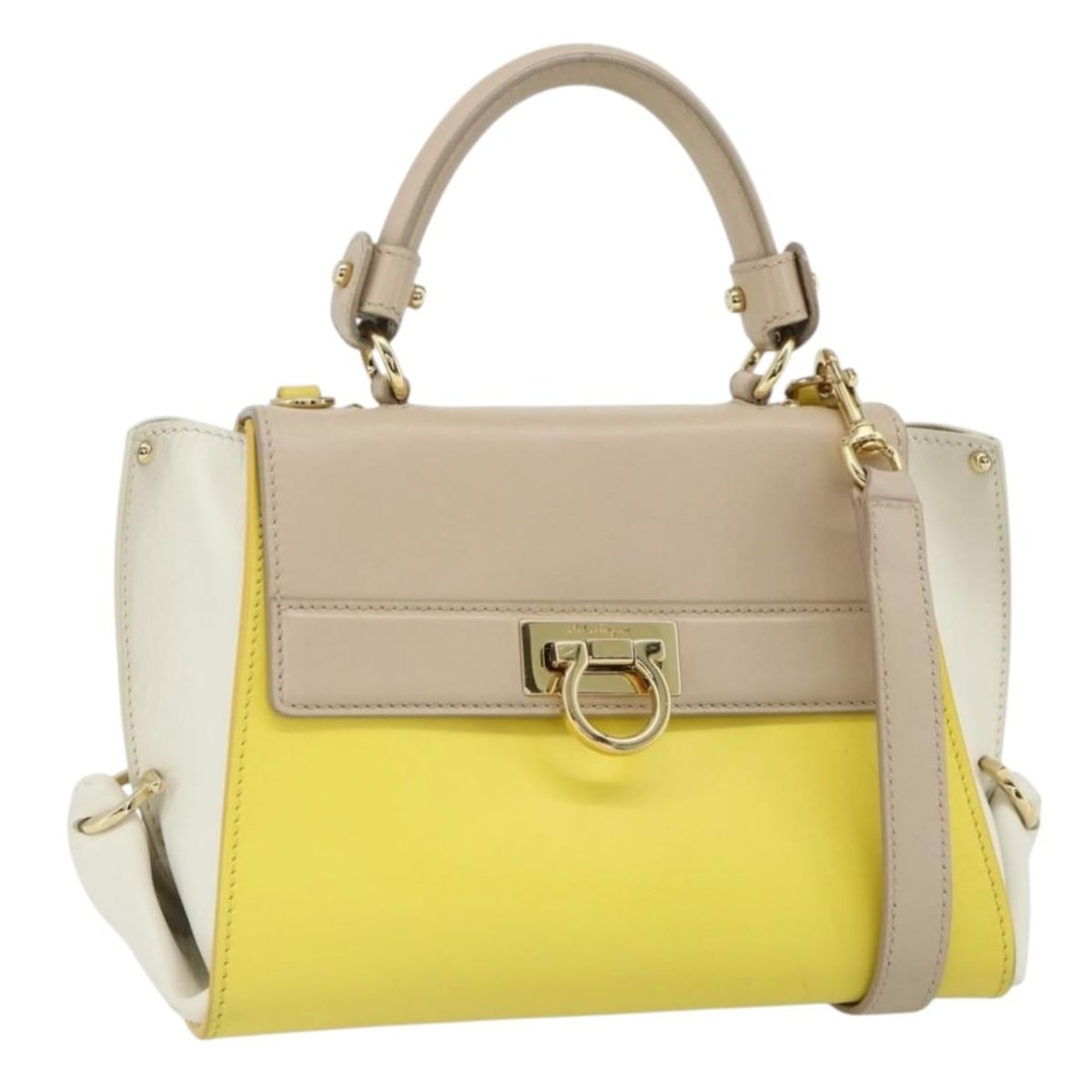 Salvatore Ferragamo Gancini 2way leather handbag yellow gold tone: Salvatore Ferragamo Gancini 2way leather handbag yellow gold tone Salvatore Ferragamo Gancini 2-way handbag in yellow/gold leather, made in Italy. It comes with a dust bag and shoulder strap, and the 