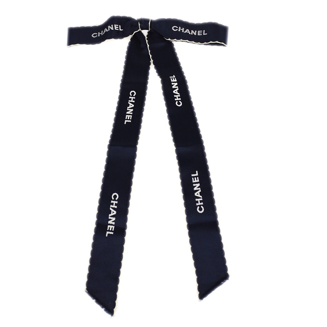 Chanel Satin Ribbon Bow Corsage Brooch Dark Navy White: Chanel Satin Ribbon Bow Corsage Brooch Dark Navy White Dark navy and white satin ribbon bow brooch pin with a Chanel motif. Made in France, this corsage-style accessory features gold-tone metal and sh