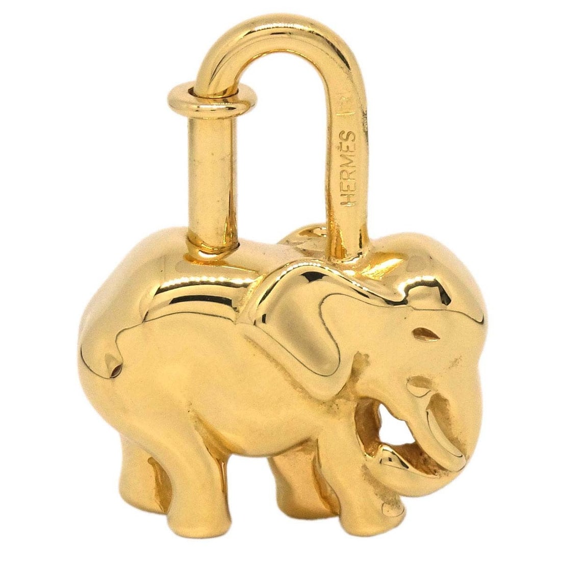 Hermes Elephant Cadena Lock Charm Gold Plated 1988: Hermes Elephant Cadena Lock Charm Gold Plated 1988 Vintage Hermes elephant motif Cadena bag charm in gold-plated metal. The piece is described as being in great condition with scuffs and comes with it