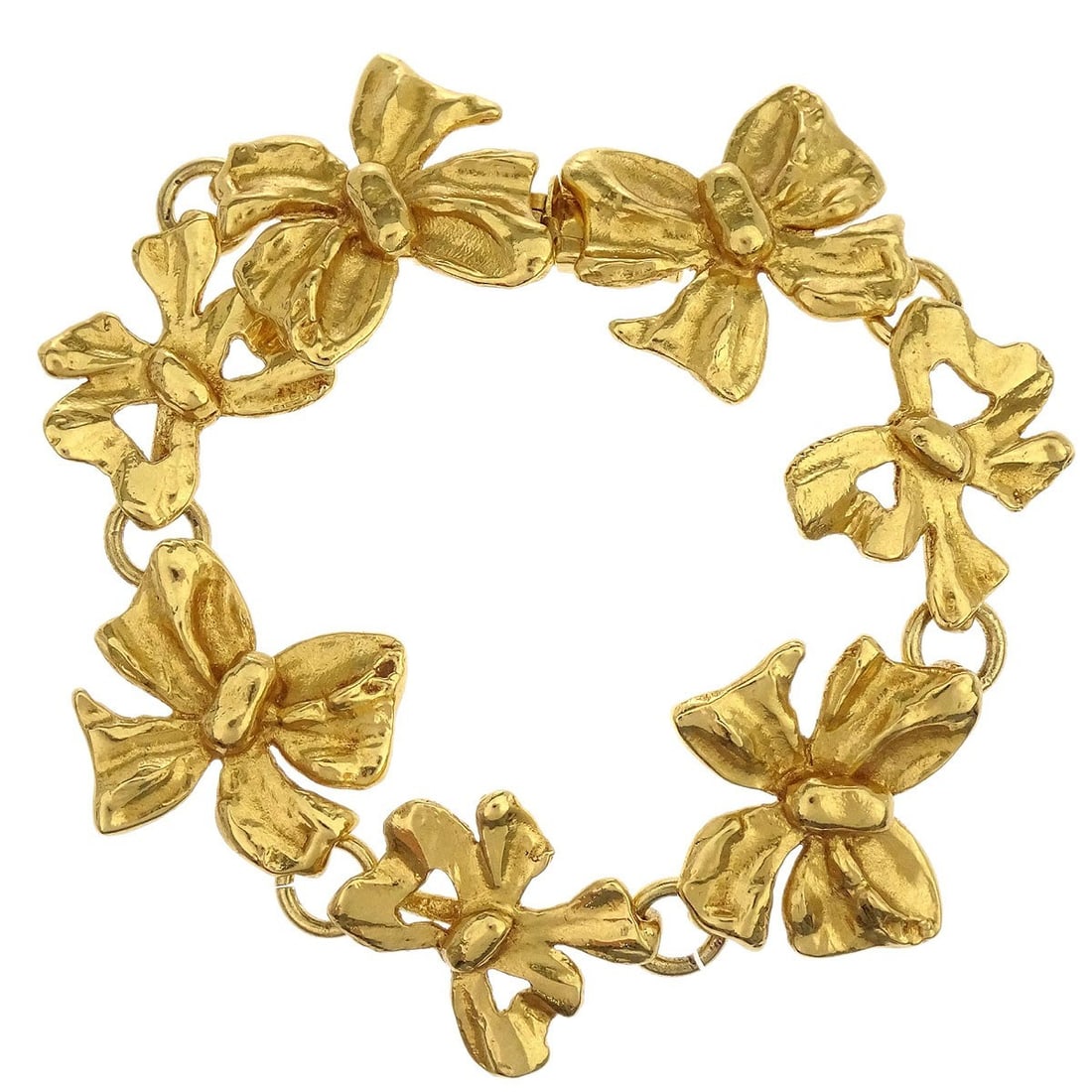 Yves Saint Laurent Bow Chain Bracelet Gold Plated France: Yves Saint Laurent Bow Chain Bracelet Gold Plated France Yves Saint Laurent gold-plated chain bracelet made in France. This bracelet features a bow accessory design and is in very good condition with 