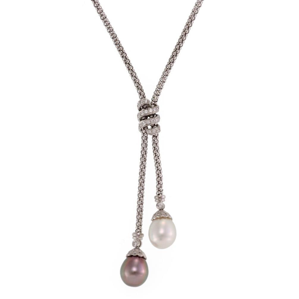 Elegant 18k White Gold Diamond Pearl Double Drop Necklace: Elegant 18k White Gold Diamond Pearl Double Drop Necklace Elevate your jewelry collection with this exquisite 18k White Gold Double Drop Pendant Necklace. This stunning piece features a unique mesh st