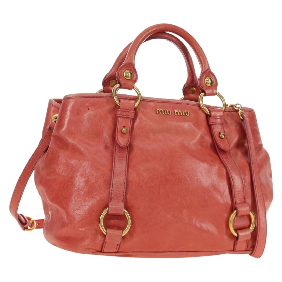 Miu Miu Pink Leather 2 Way Handbag with Shoulder Strap: Miu Miu Pink Leather 2 Way Handbag with Shoulder Strap Miu Miu leather 2-way handbag in pink with gold-tone details. It comes with a dust bag and shoulder strap, and was made in Turkey. The bag shows 