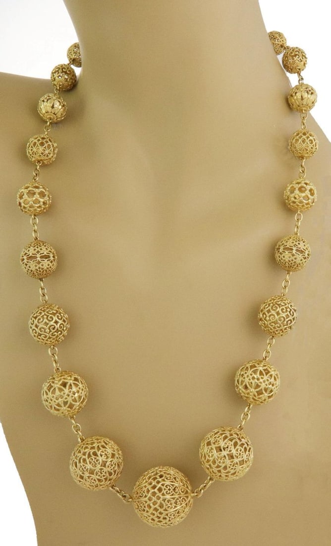 Cynthia Bach 18k Yellow Gold Filigree Ball Necklace 30 Inch: Cynthia Bach 18k Yellow Gold Filigree Ball Necklace 30 Inch Elevate your jewelry collection with this stunning long necklace by designer Cynthia Bach. Crafted from luxurious 18k yellow gold, this piec