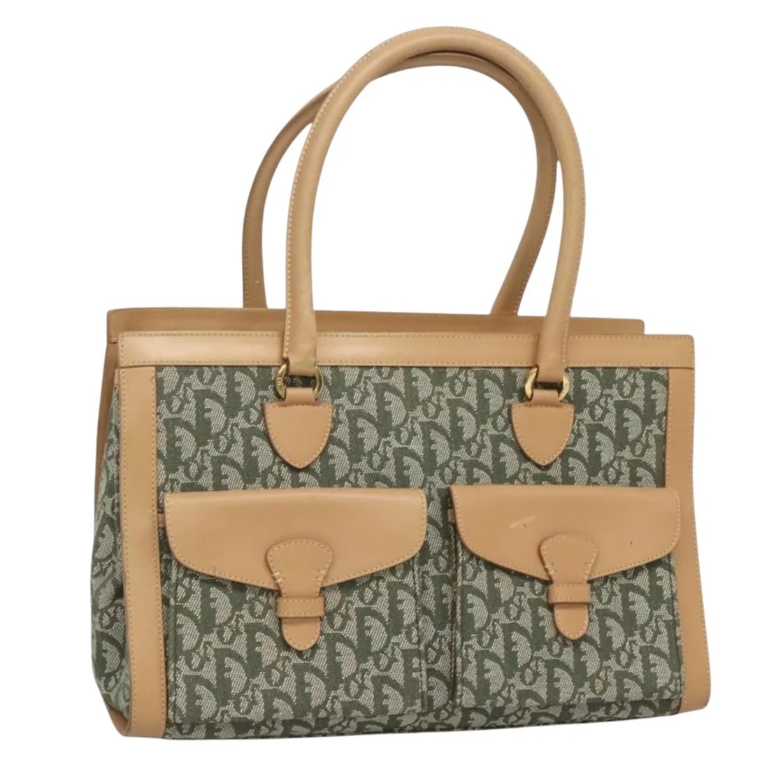 Christian Dior Diorissimo Canvas Tote with Dual Pockets Vintage Style: Christian Dior Diorissimo Canvas Tote with Dual Pockets Vintage Style This pre-owned Christian Dior Vintage Trotter Double Pocket Tote features a khaki Diorissimo canvas exterior with double front poc