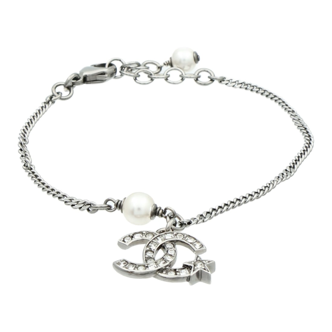 CHANEL CC Star Silver Tone Metal Bracelet: CHANEL CC Star Silver Tone Metal Bracelet A CHANEL CC Star bracelet in silver-tone metal, designed for women. The piece features a CC star motif and is presented in very good AB condition. Accessories