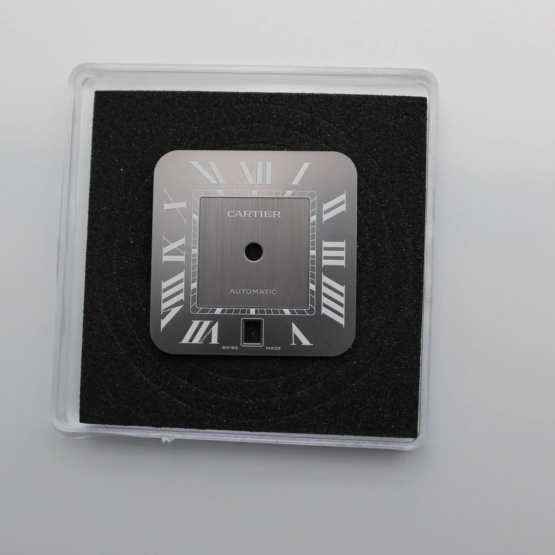 Gray Dial for Santos de Cartier Model WSSA0037: Gray Dial for Santos de Cartier Model WSSA0037 This is a gray dial for the Cartier Santos de Cartier, model WSSA0037. Designed for men, this luxury watch component is compatible with the Cartier Santo